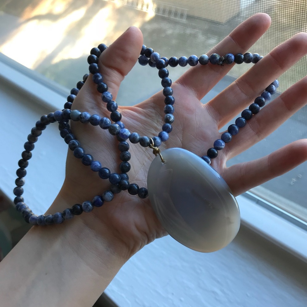 Beaded necklace with stone pendant